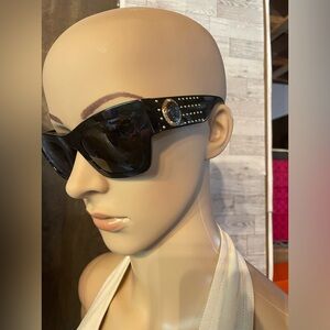 Authentic Versace sunglasses in black w signature gold details. Classic style